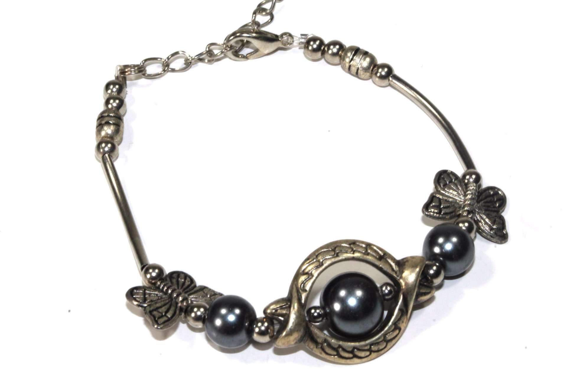 Silver Hestia Olivia antique-style butterfly trinket bracelet with intricate butterfly charms and vintage-inspired design.