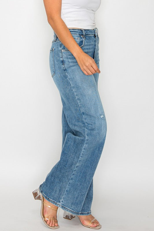 Women’s high-rise wide-leg jeans with pockets by Jade Icarus, showing the full-length denim style and relaxed fit.