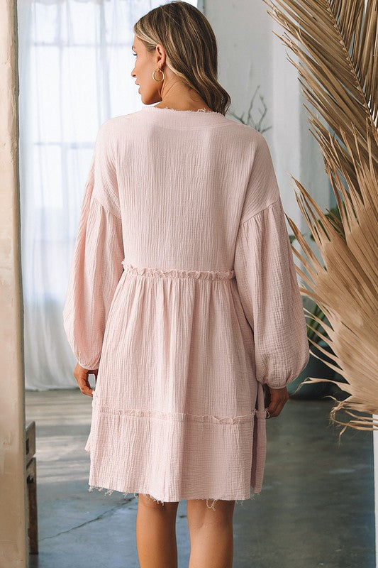 Women’s crinkle distressed puff sleeve flared dress by Jade Icarus, featuring a textured fabric and flowing silhouette.