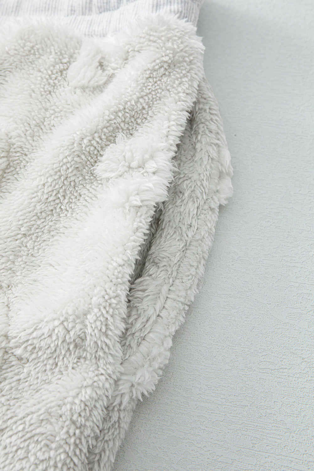 Light grey leopard textured fleece lounge set by Carmine Juneberry, loose fit with cozy, stylish design for comfortable lounging.
