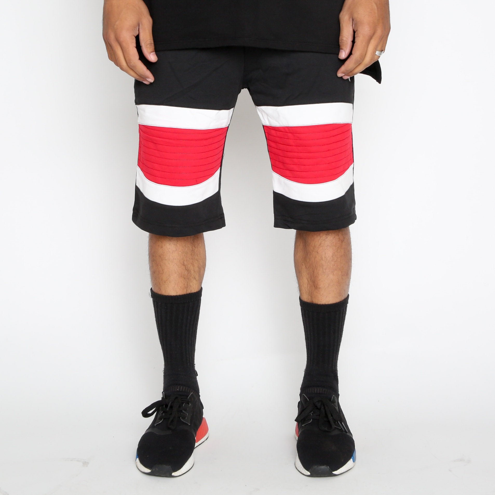 Red Stripe Moto Shorts by Lime Milo, casual shorts with bold red and white striped design, displayed on a neutral background.