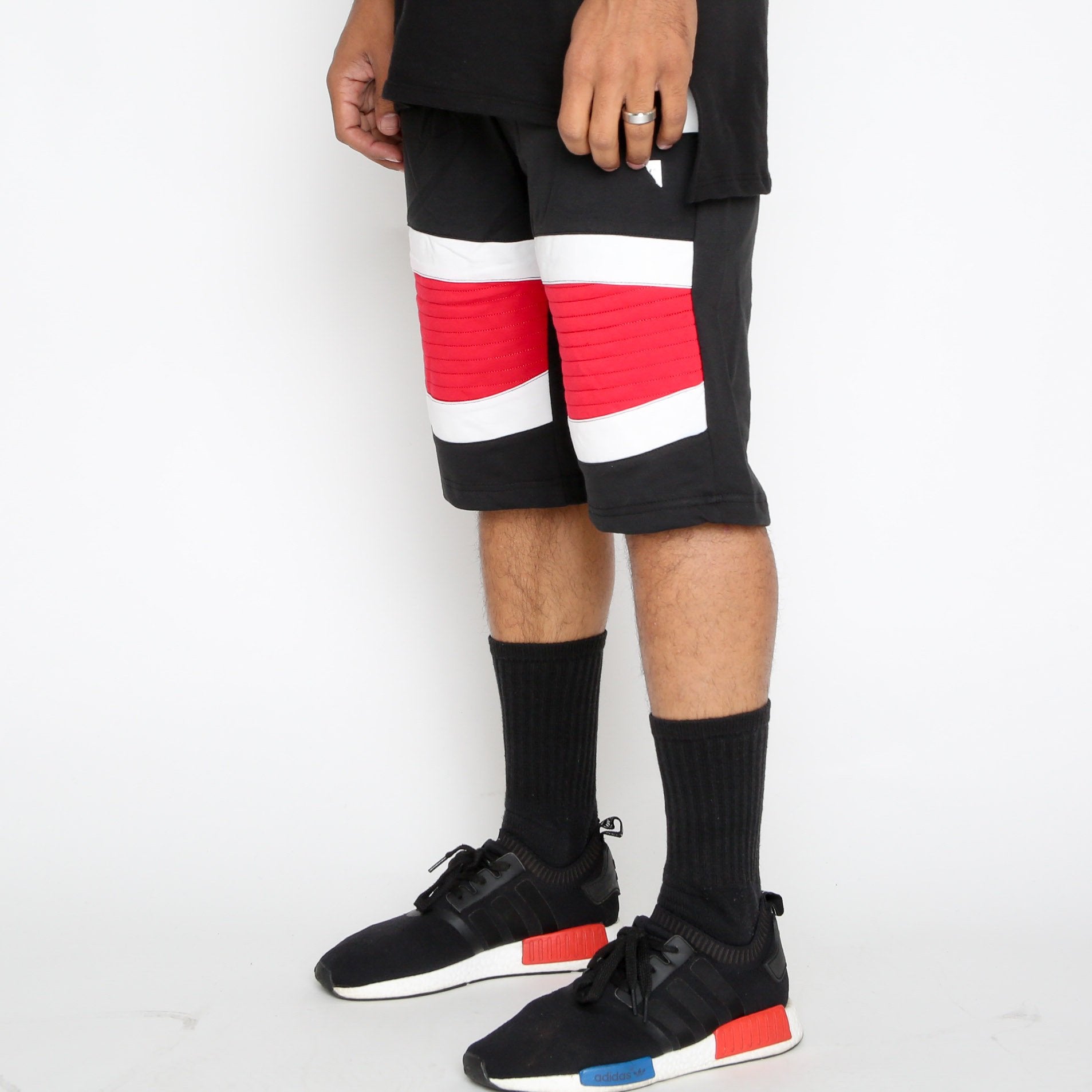 Red Stripe Moto Shorts by Lime Milo featuring a stylish design, casual fit, and vibrant red and white stripe pattern.