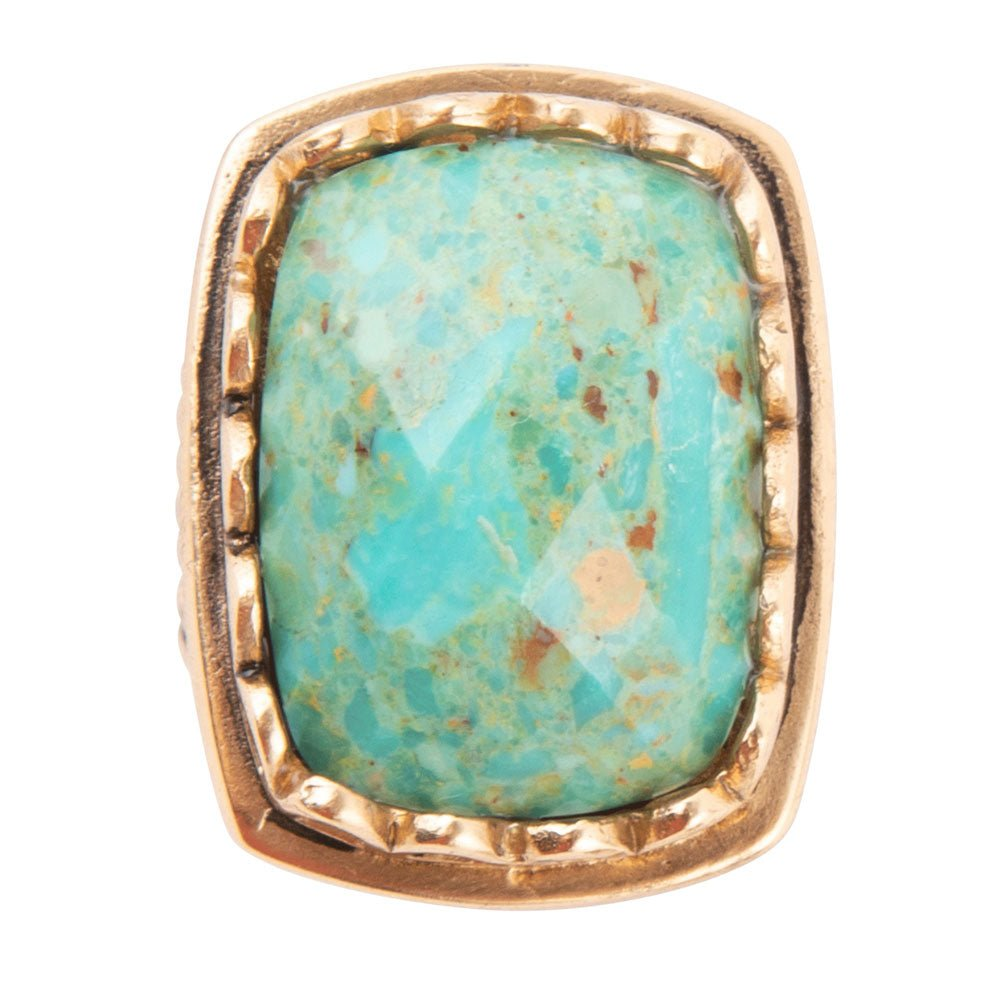 Blue turquoise and golden cocktail ring from Start2Finish, featuring a vibrant gemstone design and elegant jewelry style.