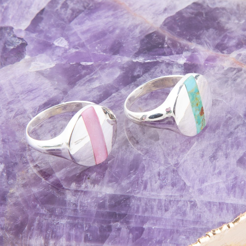 Pink opal and sterling silver circle ring from Start2Finish jewelry, featuring a polished pink opal stone set in a sleek silver band.