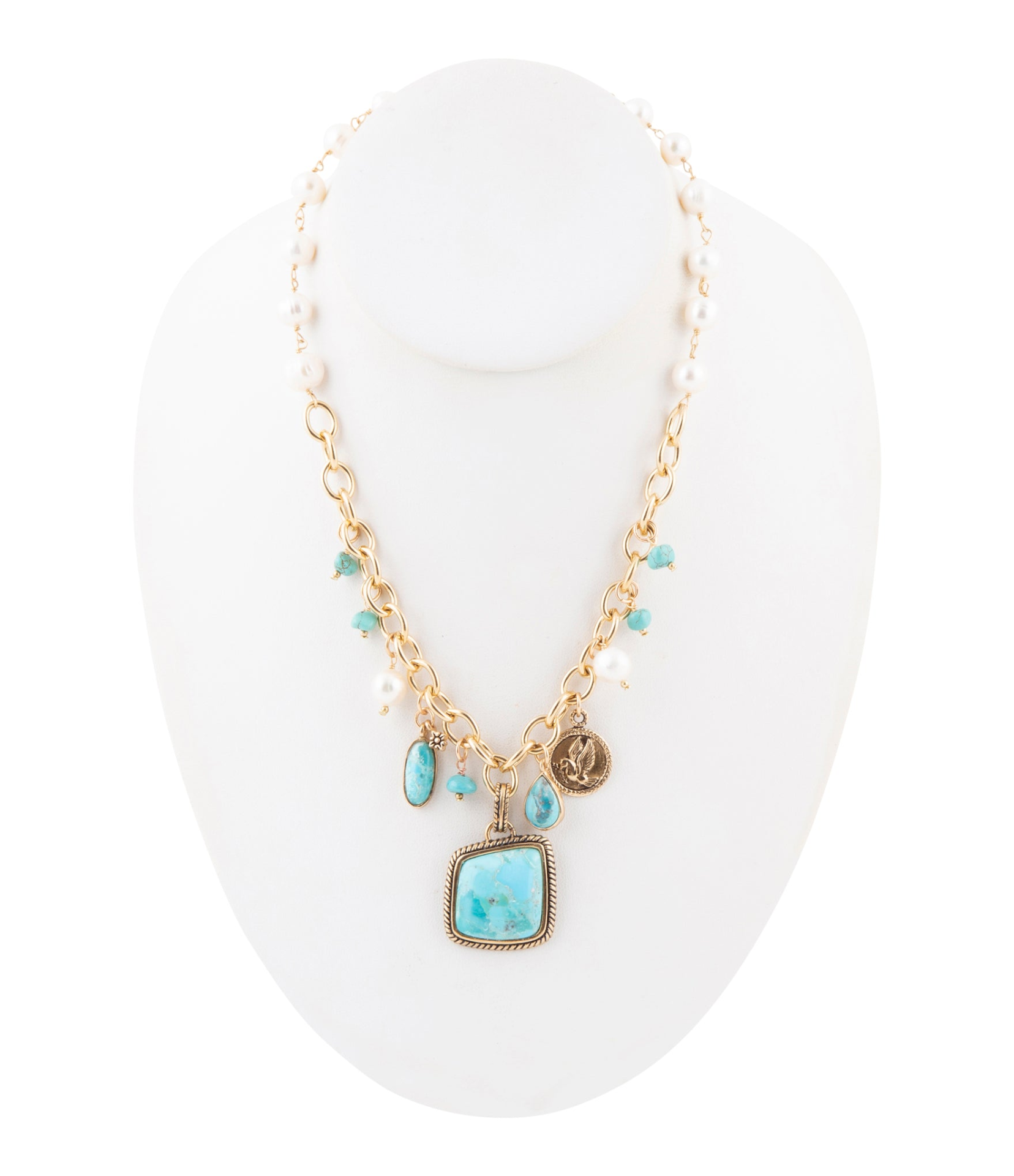 Blue turquoise and white pearl multi-pendant golden necklace, elegant jewelry with layered pendant design and gold chain.