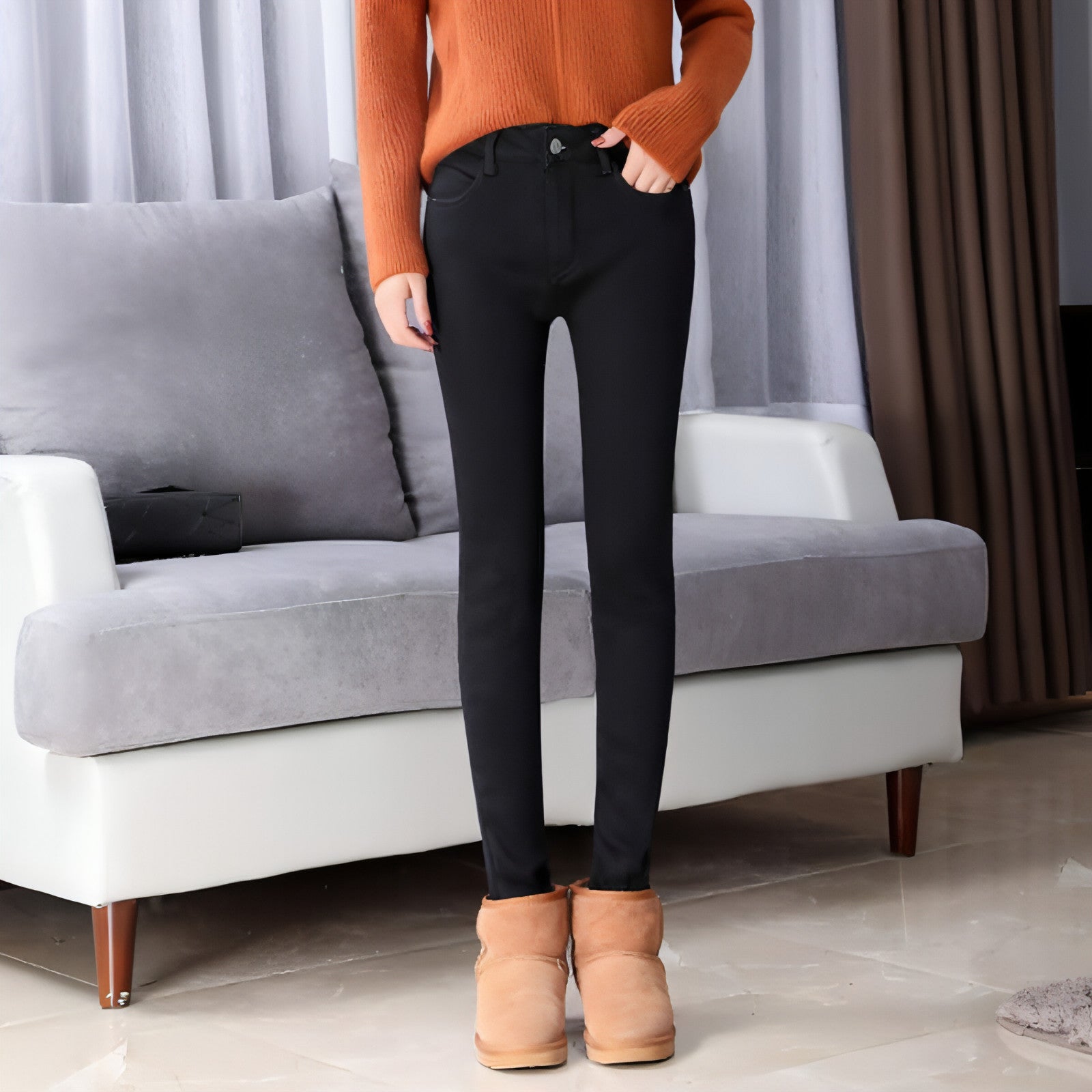 Thick lamb cashmere stretch jeans for women by Carmine Juneberry, showing the fitted denim with a high waist and stylish design.