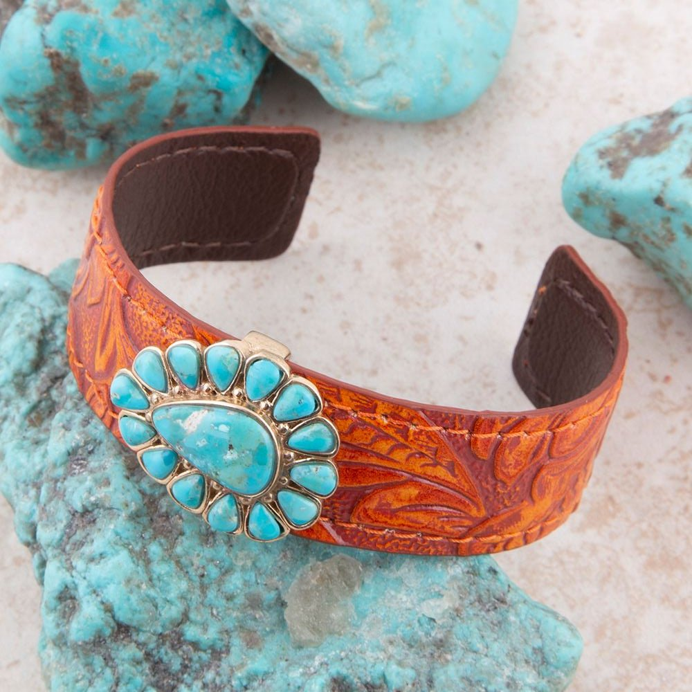 Blue turquoise leather cuff bracelet with gold accents, stylish jewelry accessory from Start2Finish.