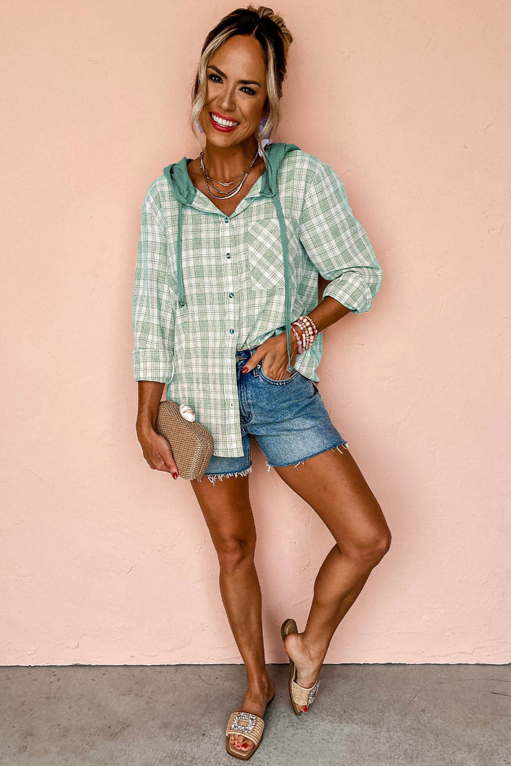 Green checkered print loose fit hooded shacket from Carmine Juneberry, featuring button-up front and casual style.