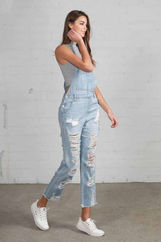 Women’s high waist distressed straight overalls by Jade Icarus, featuring heavy fabric and classic denim style.