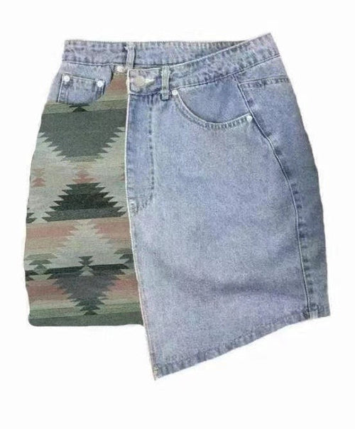 Automotive denim skirt by Jade Icarus featuring detailed stitching and a casual, stylish design with a front slit and belt loops.