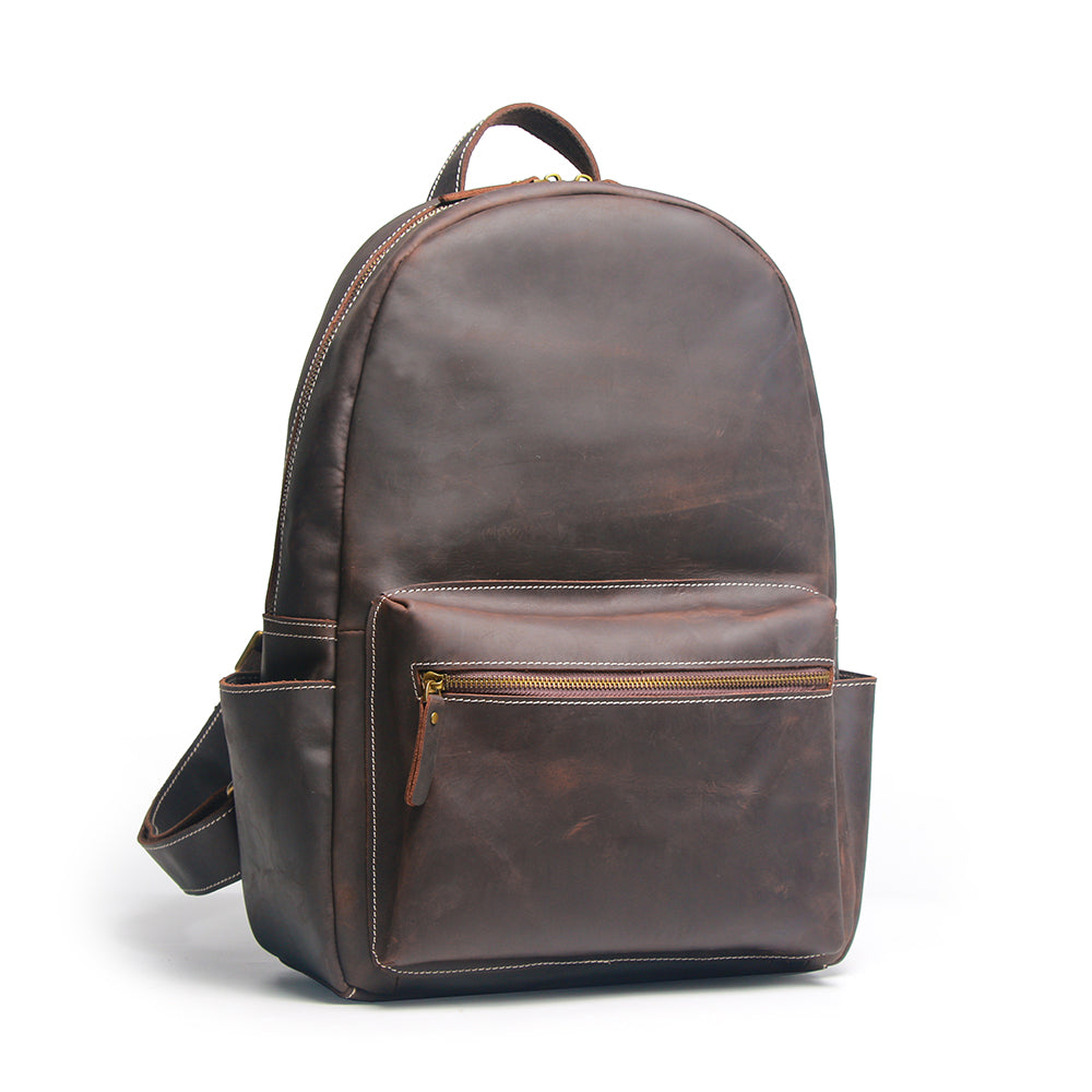 Handcrafted leather Calder Backpack by Start2Finish showing front view with adjustable straps and classic design.