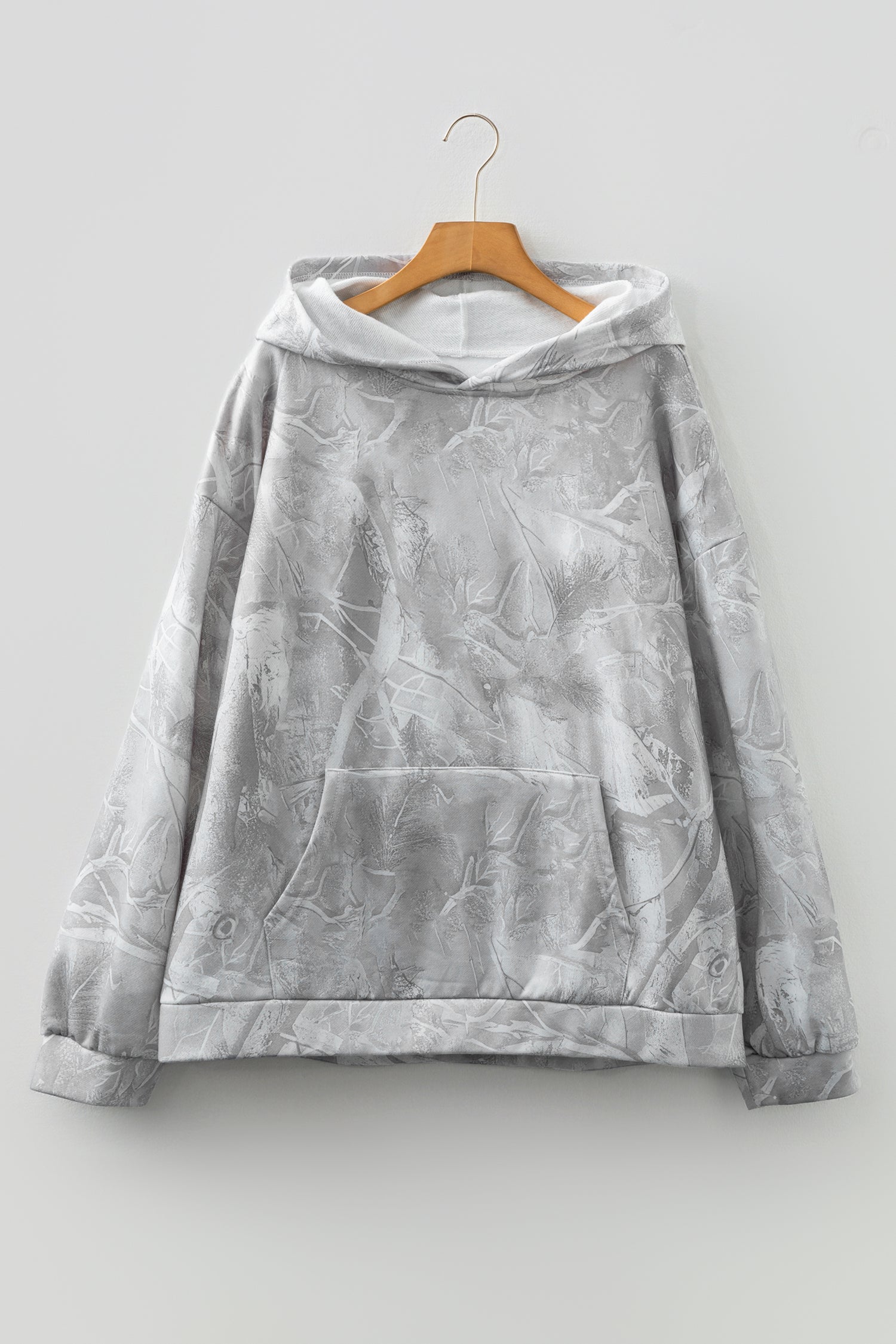 Plus size camo woodland oversized hoodie by Byzantium Bay, casual sweater with a green and brown camouflage pattern.