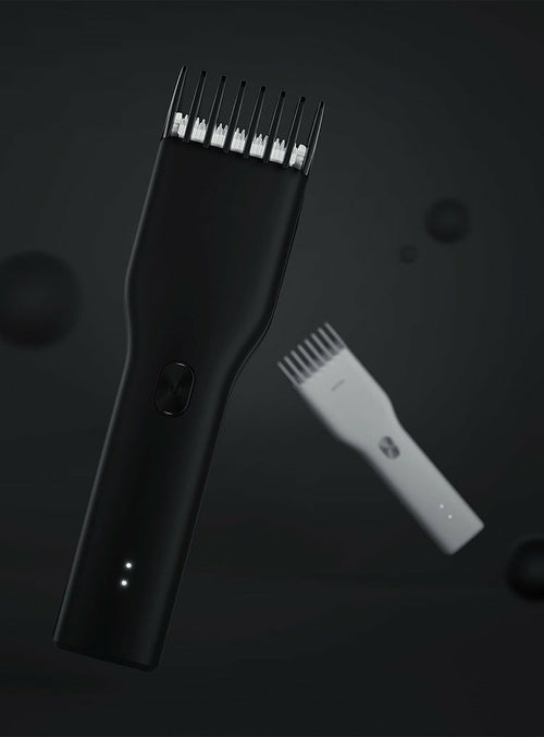 Maroon Asteria cordless hair clipper for adults and children, featuring a sleek design and adjustable blades for easy haircutting.