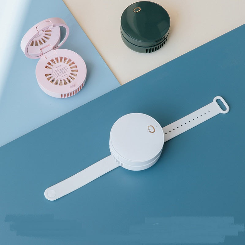 Maroon Asteria portable wrist fan with mirror, leafless design, USB rechargeable, three-speed settings for personal cooling.
