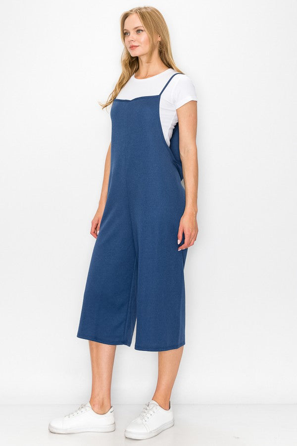 Blue oversized jumpsuit with wide-leg cropped bottoms from Yellow Hera, stylish dress for casual or chic occasions.