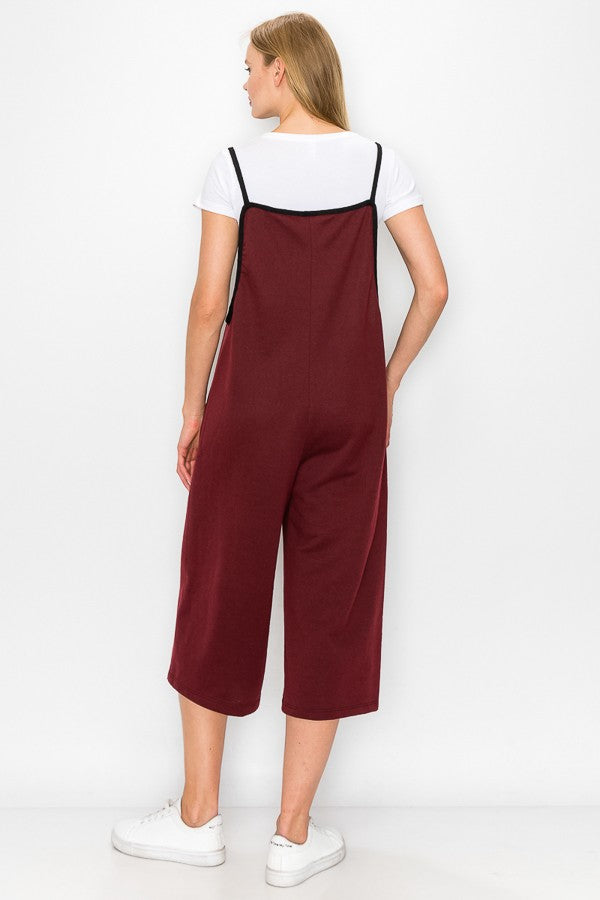 Burgundy oversized jumpsuit with cropped wide-leg pants from Yellow Hera, featuring a relaxed fit and stylish design.
