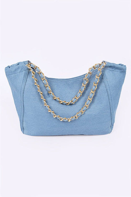 Blue denim tote bag by Jade Icarus with sturdy handles and spacious interior, perfect for casual everyday use.