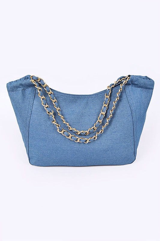 Denim fashion tote bag by Jade Icarus with sturdy handles and spacious interior, perfect for everyday use.