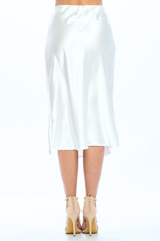 Jade Icarus made in USA solid stretch satin midi skirt, shown in a sleek, smooth fabric with a fitted waist and midi length.