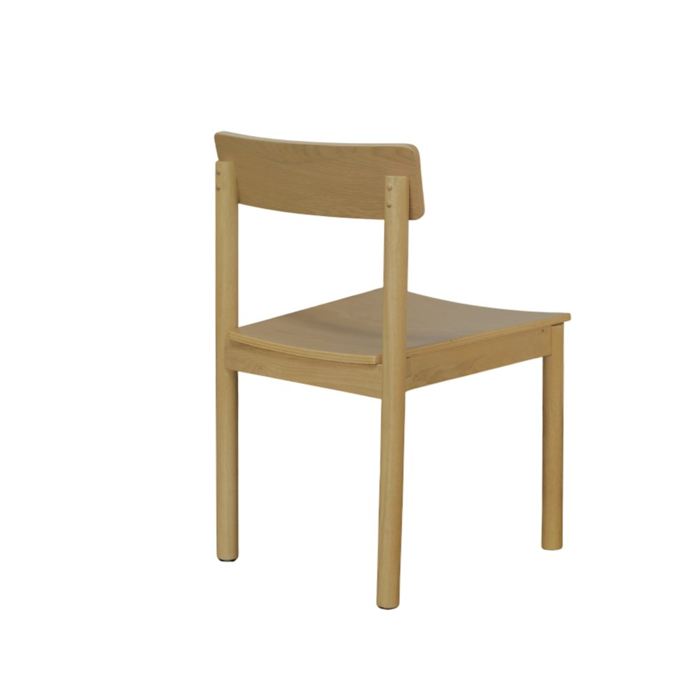 Light oak Hudson side chairs by Start2Finish, showcasing sleek wooden furniture with modern design and smooth finish.