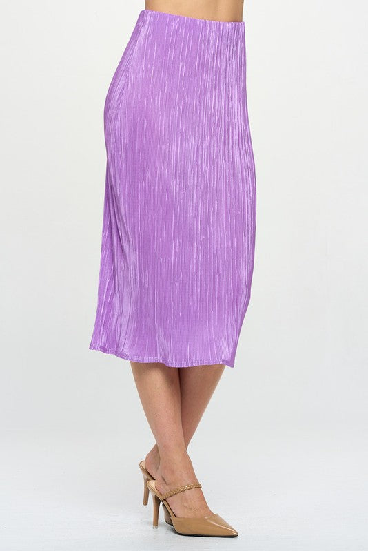 Vibrant plisse midi skirt by Jade Icarus, made in the USA, displayed in bright colors and flowing fabric.