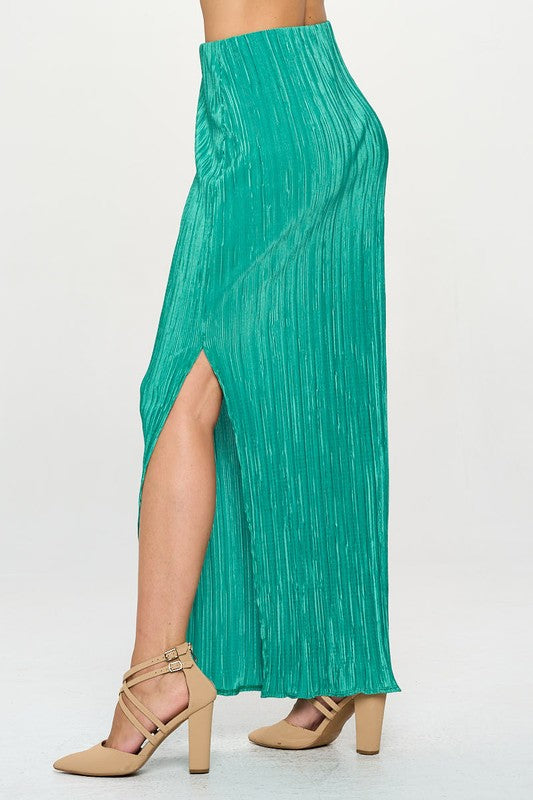 Automotive interior featuring a Jade Icarus plisse maxi skirt with slit, showcasing sleek fabric and stylish design details.