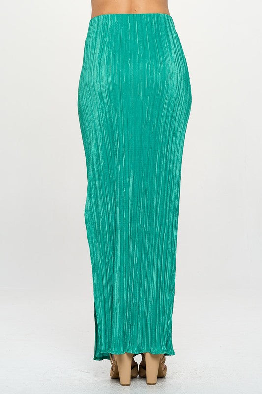 Automotive Jade Icarus plisse maxi skirt with slit, featuring flowing fabric and stylish design.