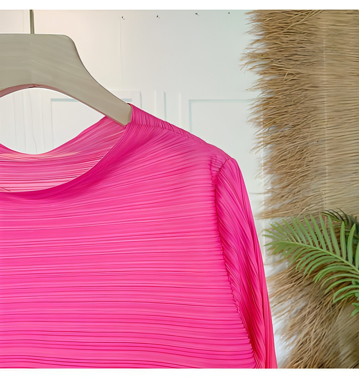 Plus size pleated dress for women by Carmine Juneberry, featuring a flowing design and elegant fit.
