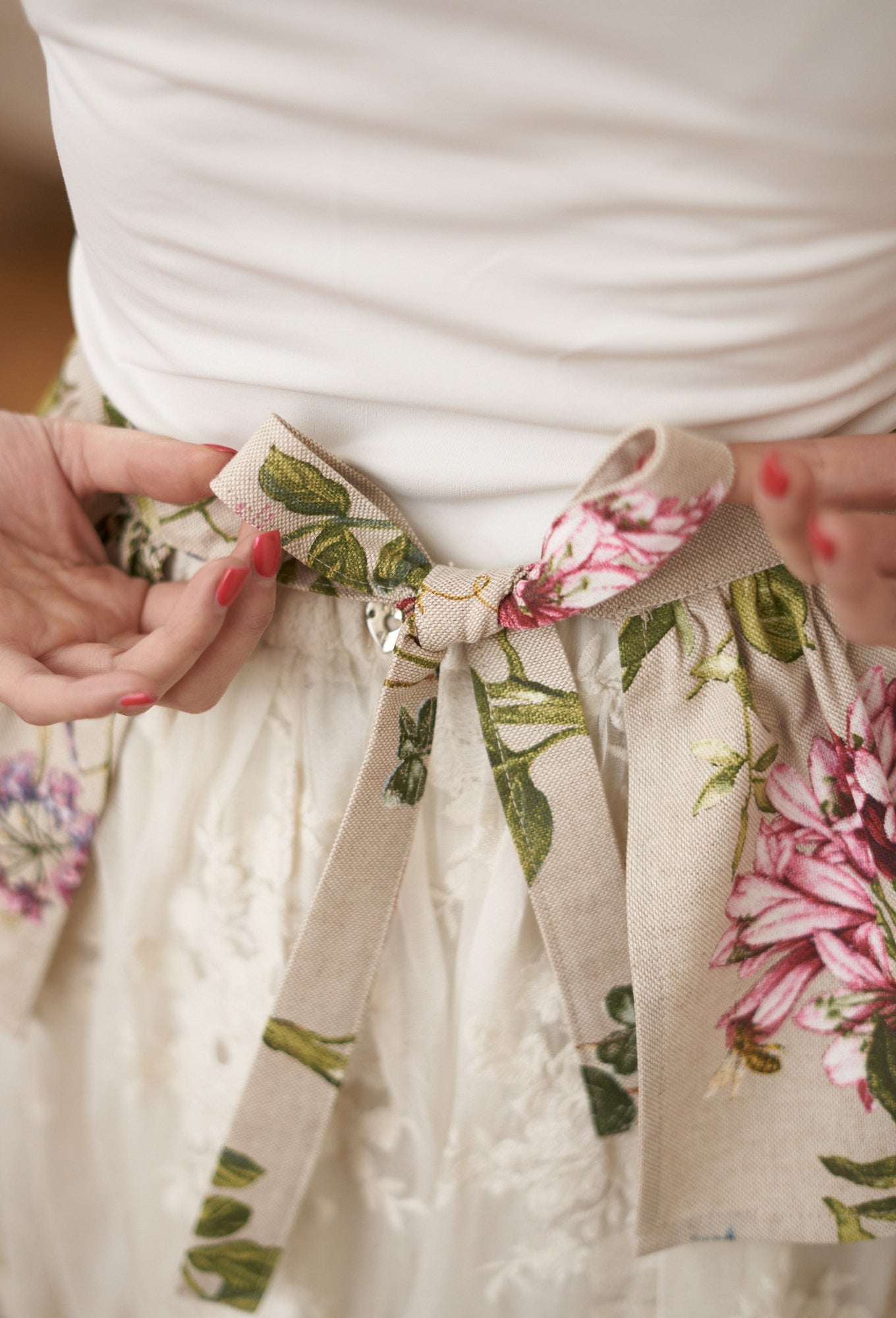 Ladies printed poly-cotton half apron with floral hortensia design, perfect for home decor from Rose Trillium.