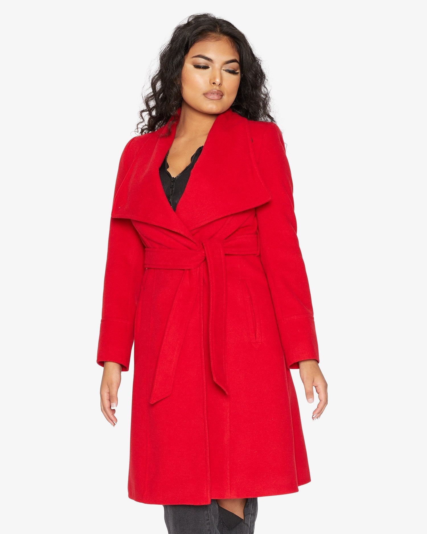 Rose Eleusis waterfall lapel double-breasted duster coat hanging on a rack, showcasing elegant jacket style and fabric details.