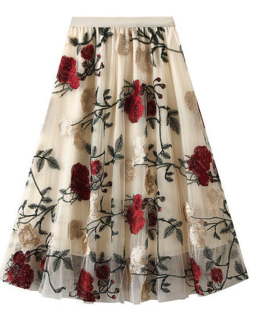 Rose pattern midi skirt by Jade Icarus, featuring a floral design with a flowing fabric and midi length.