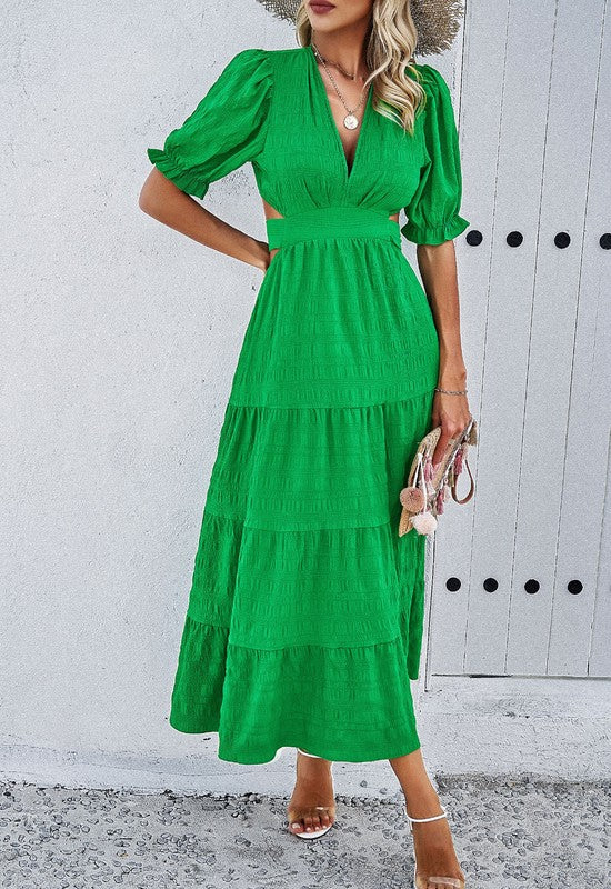 Jade Icarus open back midi dress for women, featuring a stylish design and flowing fabric suitable for elegant occasions.