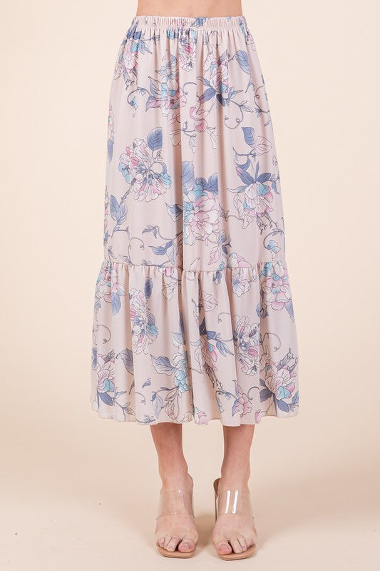 Automotive Jade Icarus Ruffle Bottom Floral Print Skirt with ruffled hem and vibrant floral design, displayed on a mannequin.