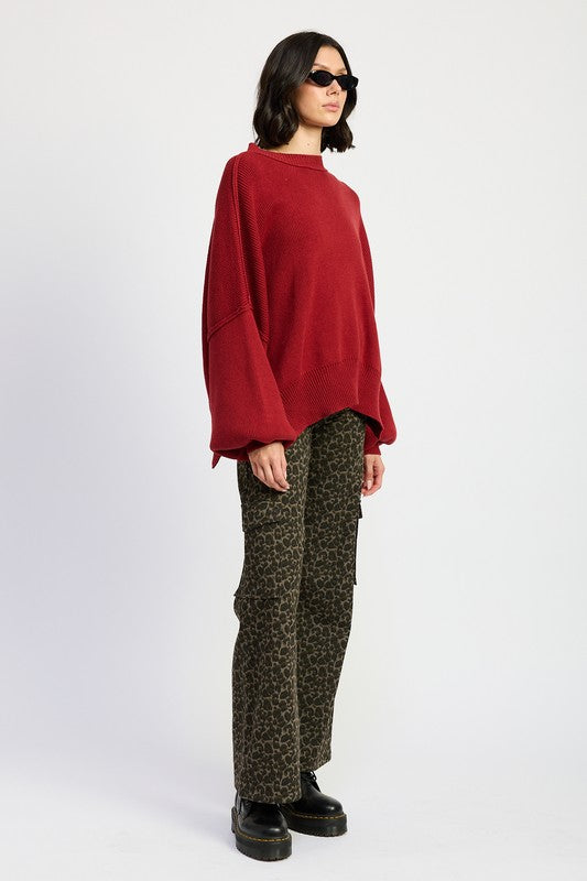 Jade Icarus mid-rise wide-leg cargo pants with large side pockets and relaxed fit, shown in a neutral fabric.