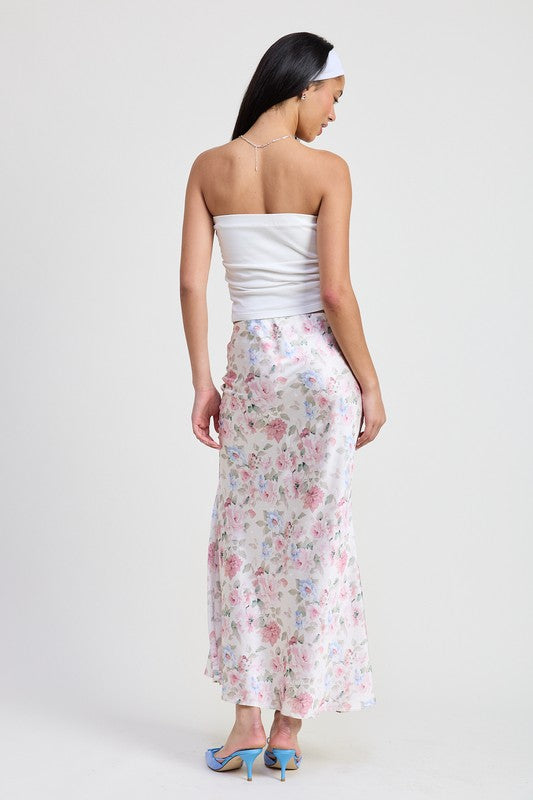 Automotive bias floral maxi skirt from Jade Icarus with vibrant floral patterns and flowing fabric design.