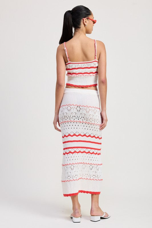 Automotive Maxi Crochet Skirt by Jade Icarus featuring intricate crochet design and flowing fabric, displayed on a mannequin.