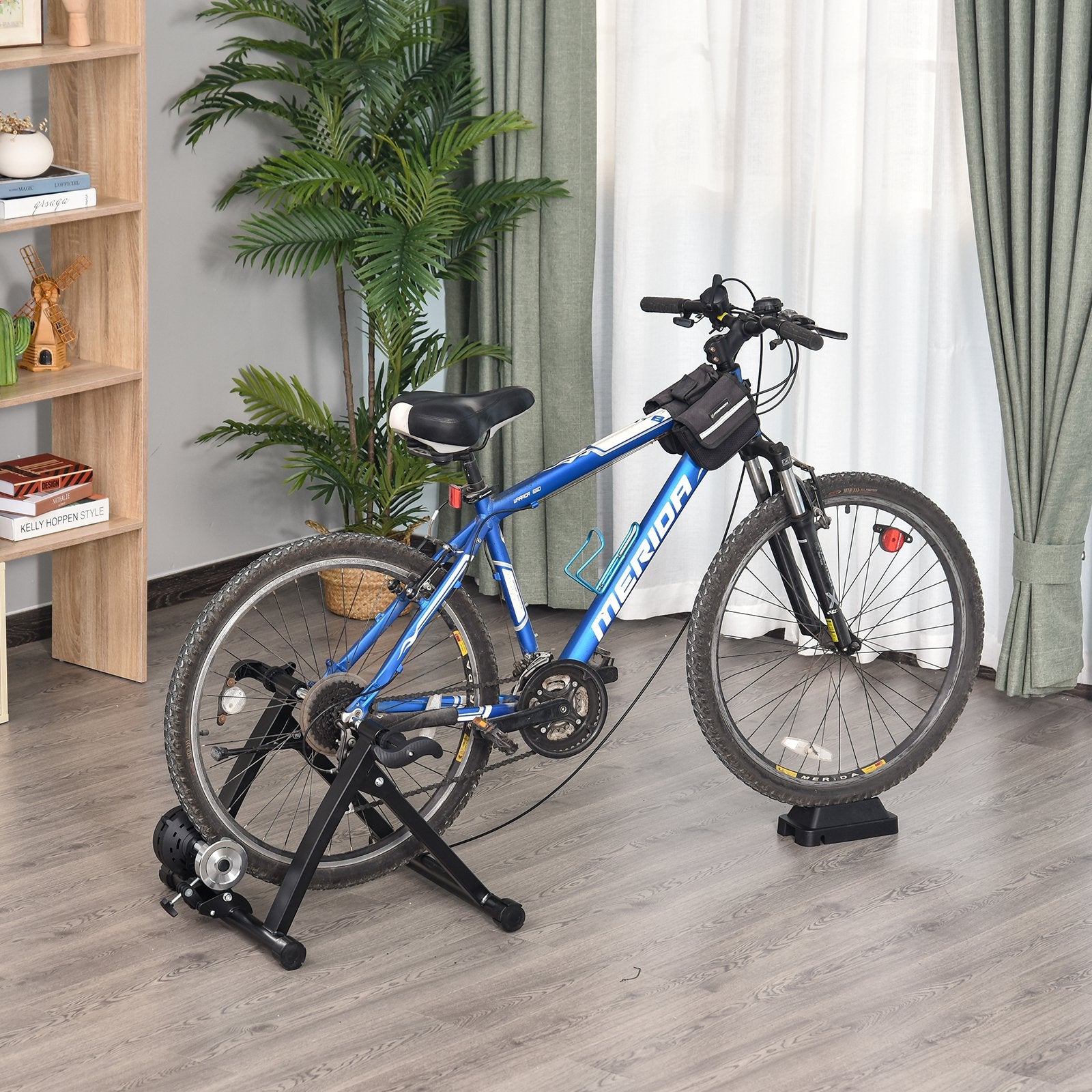 Indoor magnetic bike trainer stand by Taupe Shadow with 5 resistance levels for indoor cycling workouts.