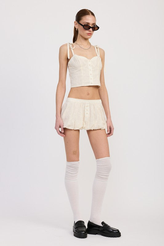 Automotive Bubble Mini Skirt with elastic waistband by Jade Icarus, featuring a sleek, stylish design and comfortable fit.