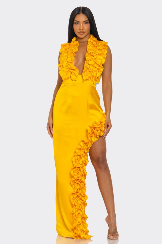Womenâs Golden Hour Ruffle Gown by Jade Icarus, flowing fabric with ruffled details, perfect for elegant occasions.