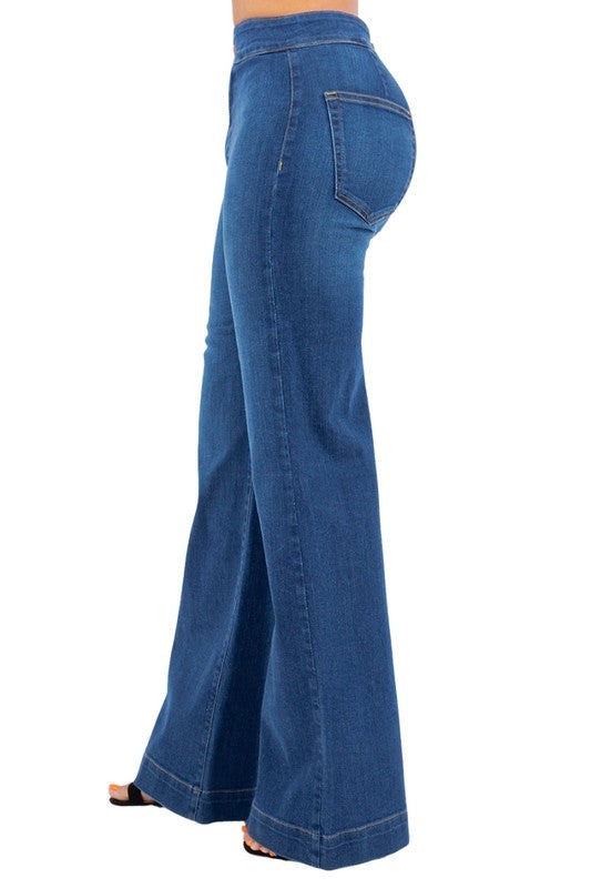 Jade Icarus Robin wide-leg flare jeans in medium blue denim, showing the relaxed fit and stylish flare silhouette.