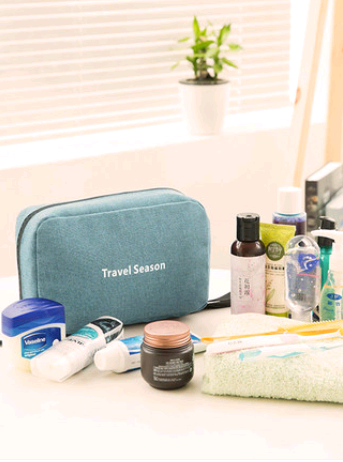 Maroon Asteria portable travel hook makeup bag with multiple compartments for organizing cosmetics and accessories.