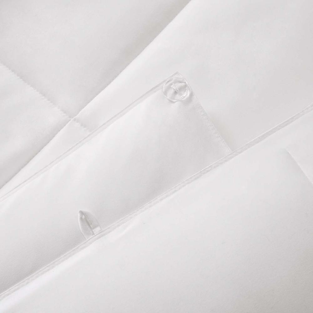 Start2Finish all season 2-in-1 down alternative comforter displayed on a bed, showcasing its cozy, versatile bedding design.