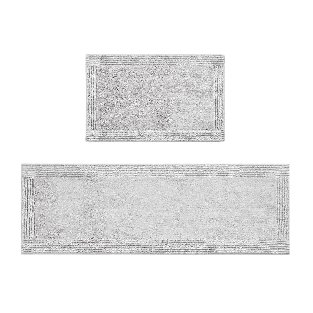 Reversible cotton bath rug with 3000GSM, plush tufted texture, in neutral tones, by Start2Finish for a soft, absorbent bath mat.