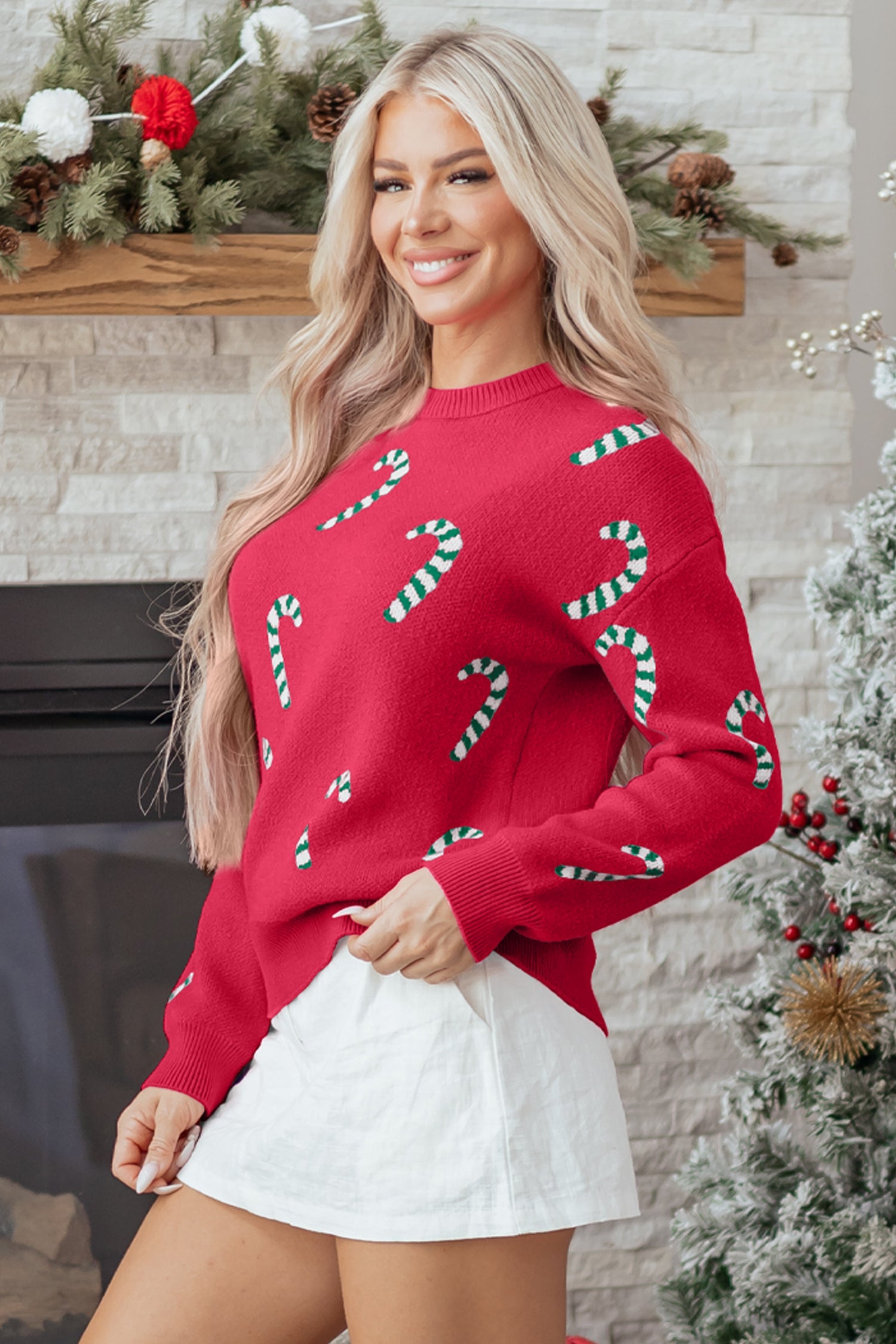 Byzantium Bay Christmas Candy Cane Drop Shoulder Sweater featuring festive red and white candy cane pattern on cozy knit fabric.