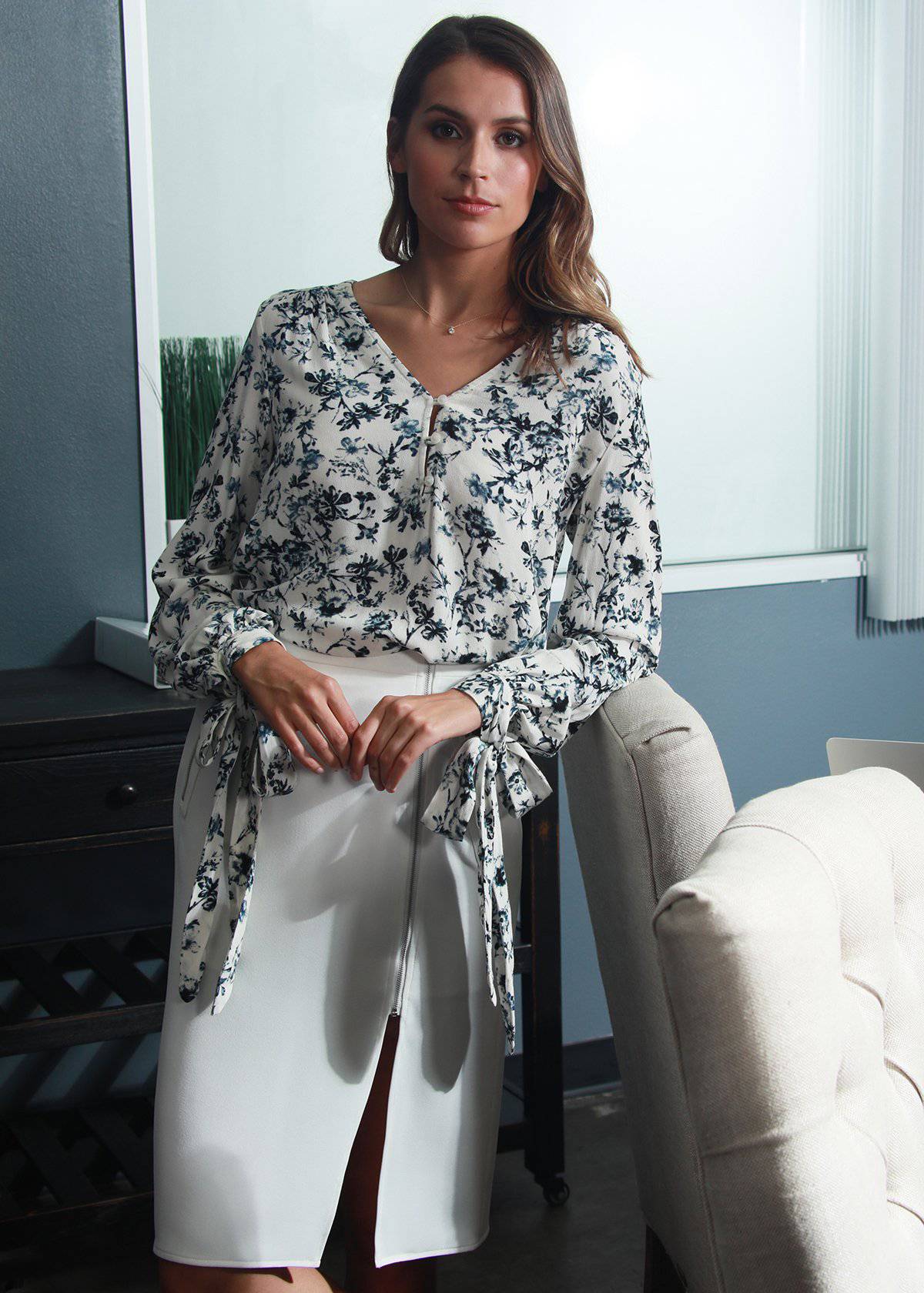 Ivory floral garden V-neck tie cuff blouse from Lemon Hera, featuring a stylish design with delicate floral patterns.