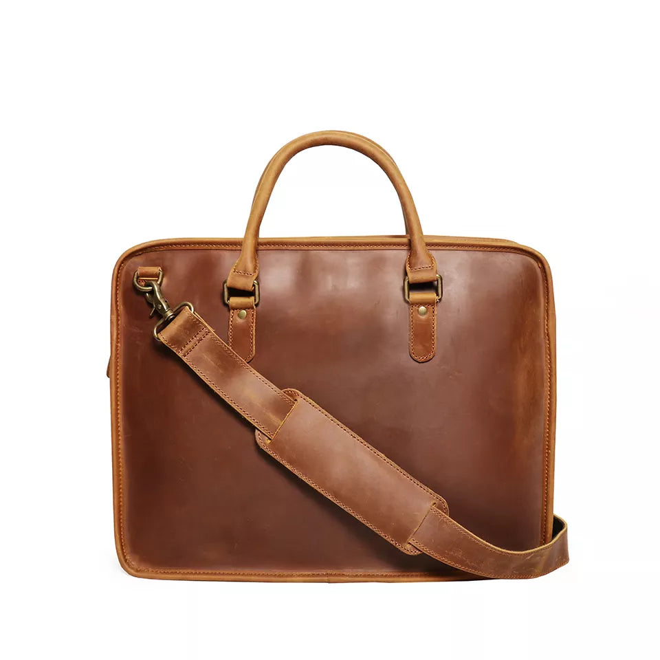 Vintage leather Hemming laptop bag by Start2Finish with sturdy handles and classic briefcase design, suitable for professional accessories.