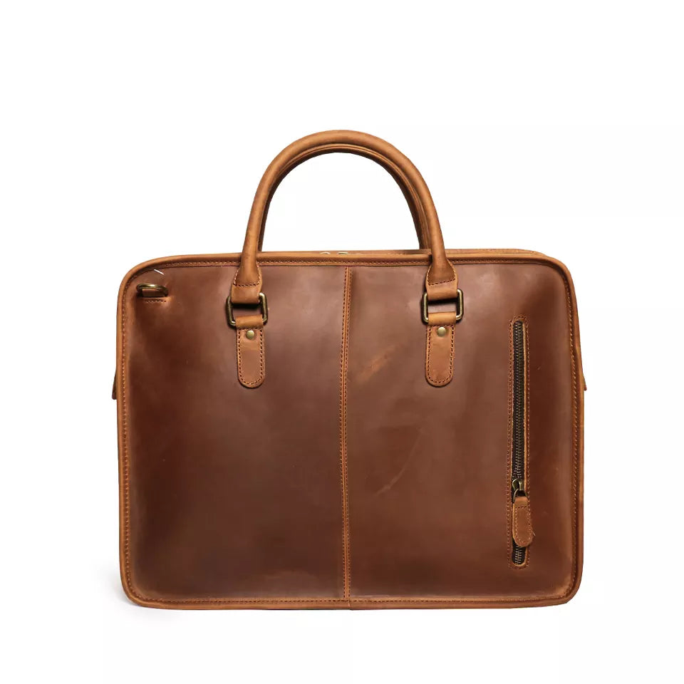 Hemming Leather Laptop Bag by Start2Finish, vintage leather briefcase with sturdy handle and spacious interior for accessories.