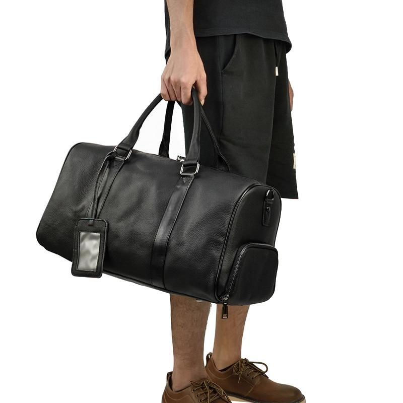 Start2Finish Endre Weekender vintage leather duffle bag with sturdy handles and spacious main compartment for travel accessories.