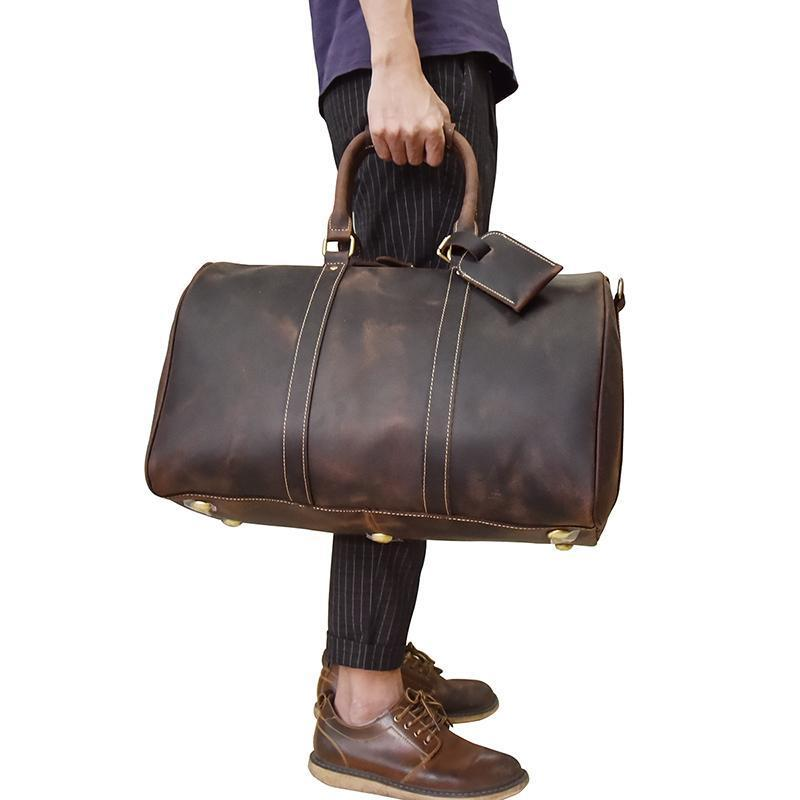 Handcrafted leather duffle bag from the Bjarke Weekender collection by Start2Finish, featuring sturdy handles and elegant design.