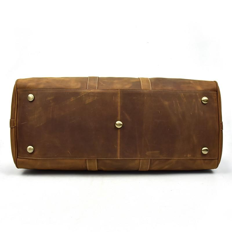 Start2Finish Bjarke Weekender handcrafted leather duffle bag with sturdy handles and spacious interior for travel accessories.